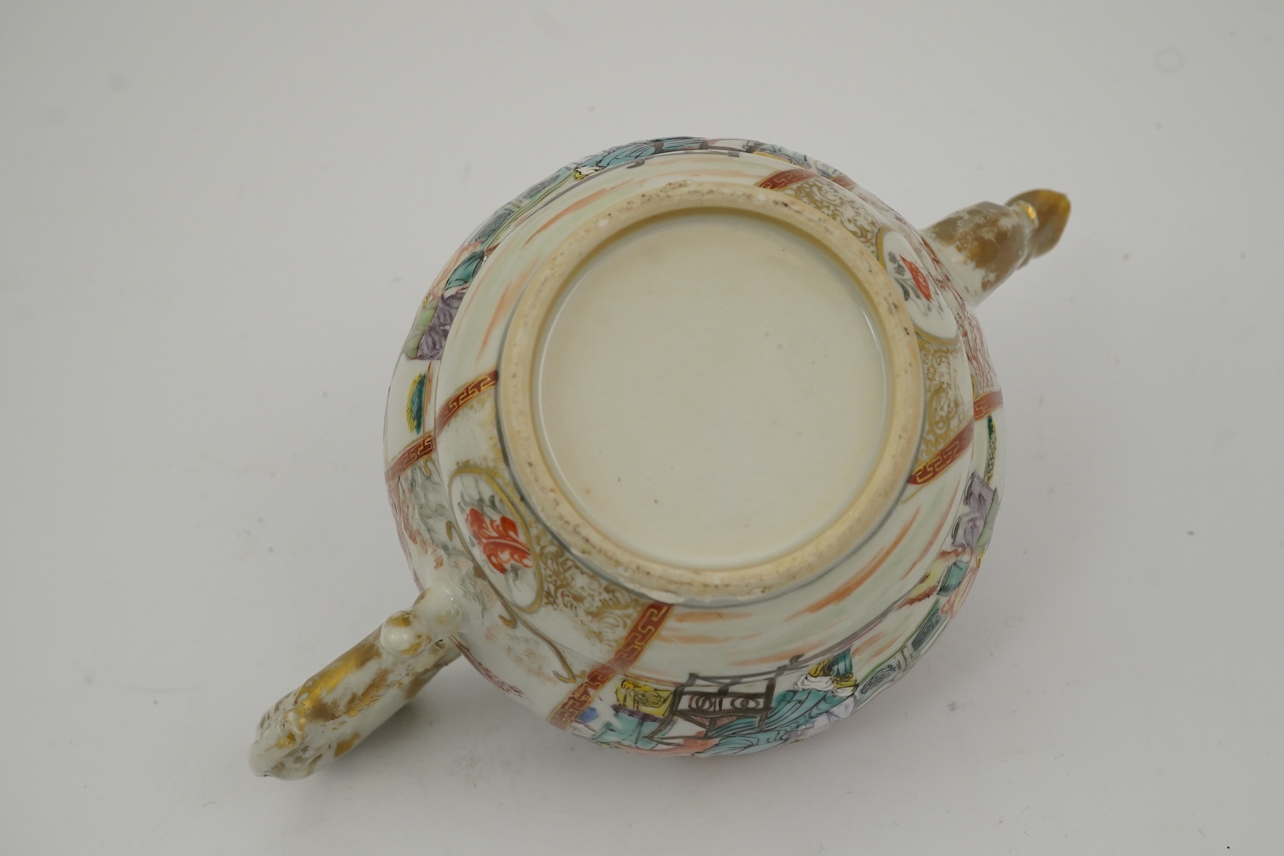 A Chinese famille rose ‘mandarin’ ogee shaped teapot, Qianlong period